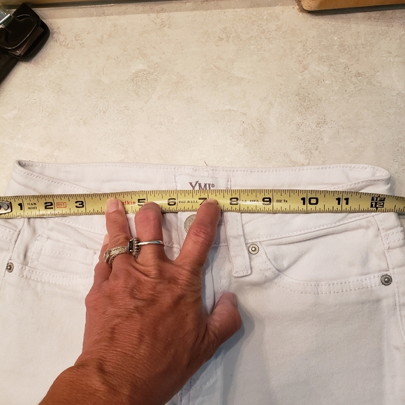 Cute white jeans, ripped at knees with flare bottoms. Great condition. - Picture 3 of 8